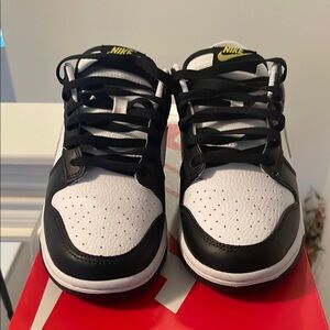 Nike Black and White Sneakers with Yellow Accents